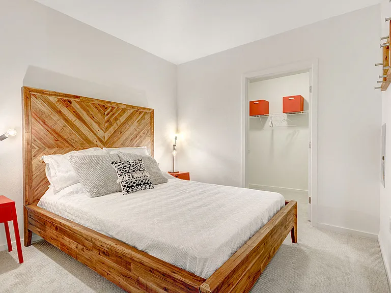 Spacious soft carpeted bedrooms with walk-in closets
