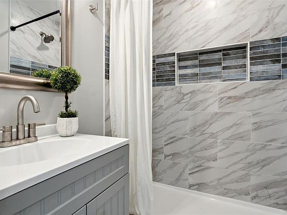 Get ready in your beautiful updated primary bathroom