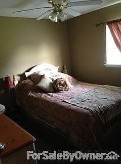 2nd Bedroom
						:
						Hallway with new floors leads to bedrooms and bathroom