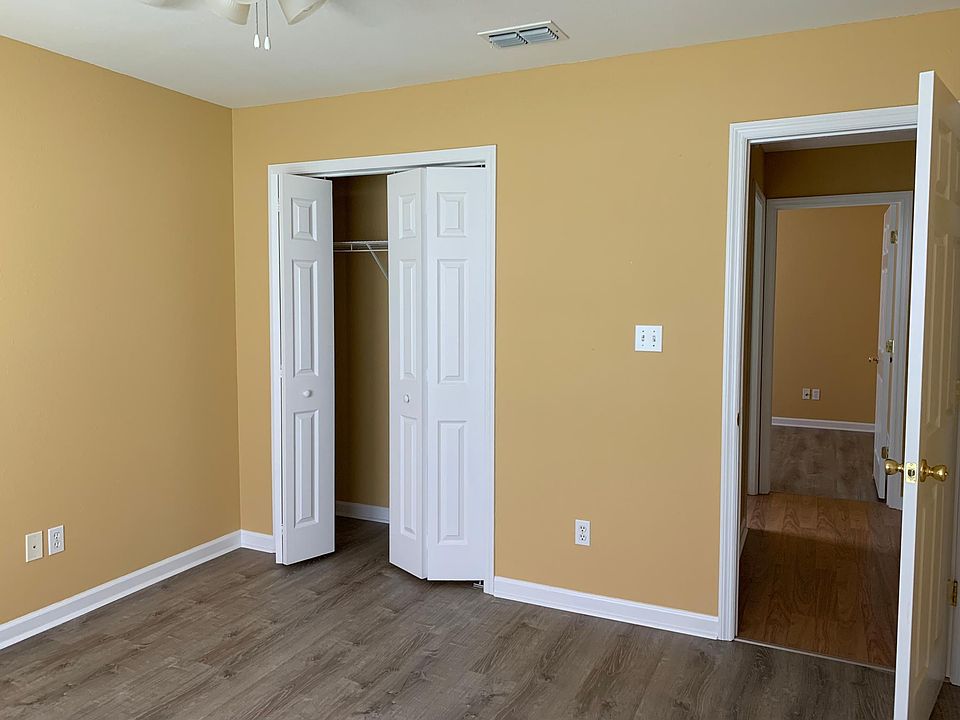 Bedroom 1 and adjoining Bedroom 2 via small hallway