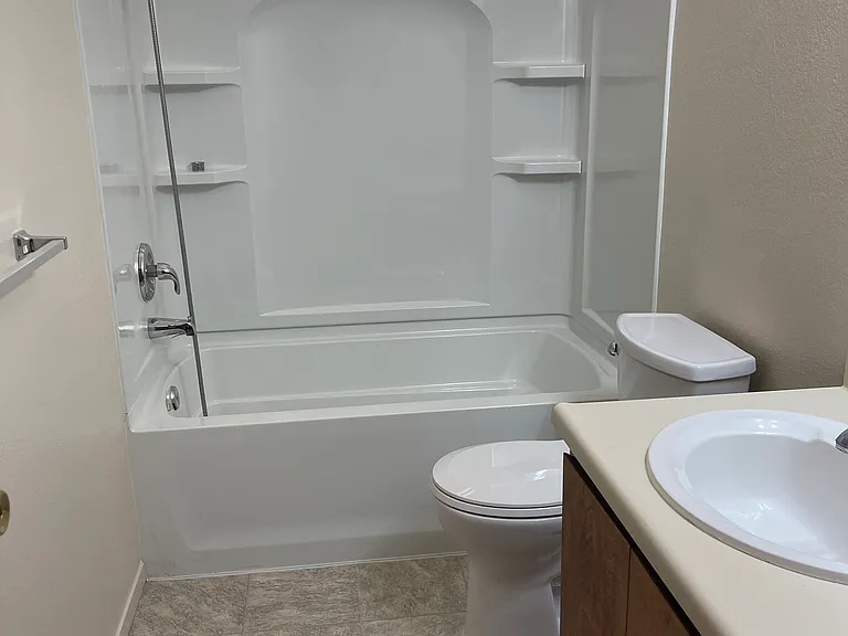 BATHROOM WITH NEW TOILET & NEW VINYL FLOORING