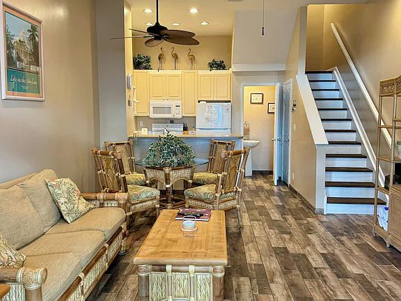 Expansive open style living room and dining room table set.