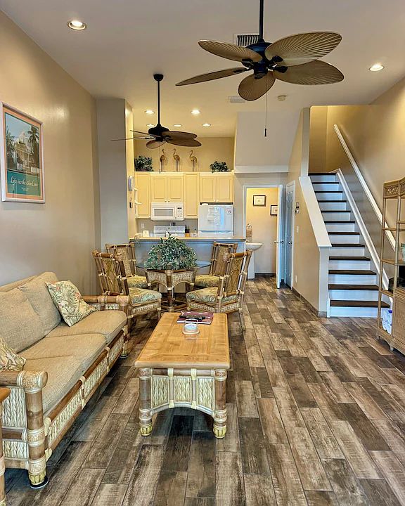 Expansive open style living room and dining room table set.