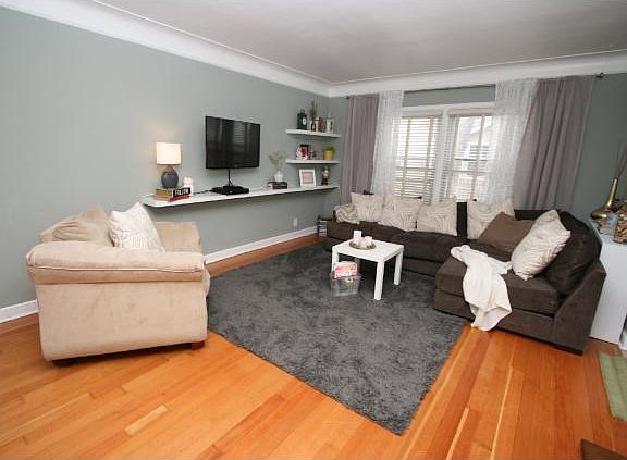 Modern & Stylish from the start! White woodwork and gleaming hardwood floors welcome you to this gem!