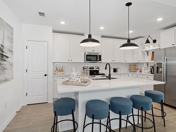 Palatial kitchen with floating shelves matte black hardware