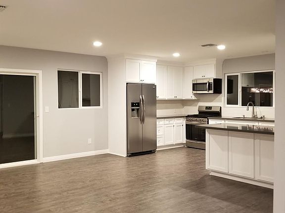 Kitchen with Living room and Dining area