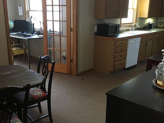 French doors from the kitchen and dining room to the office,