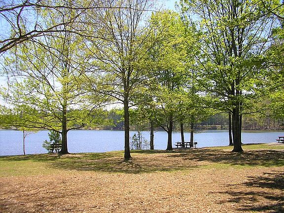 Short private path right to the water's edge.