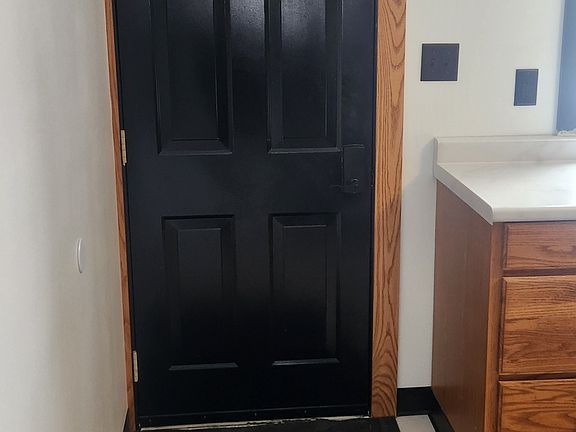 Back door to driveway/off road parking and backyard
