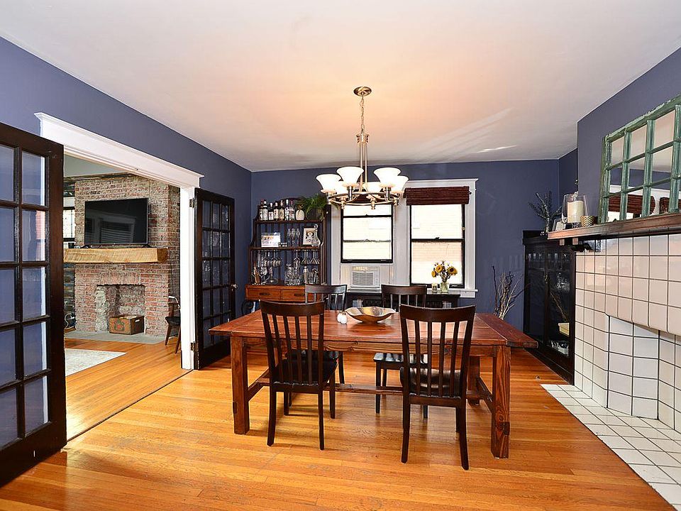 Dining room open to living room and kitchen. Doors can be closed if needed. Fireplaces are only decorative.