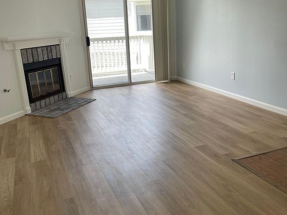 Living room opens to private balcony