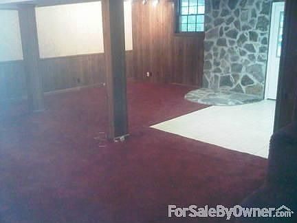 Basement
						:
						Space for a wood stove. Full size laundry room on this floor and exit to outside