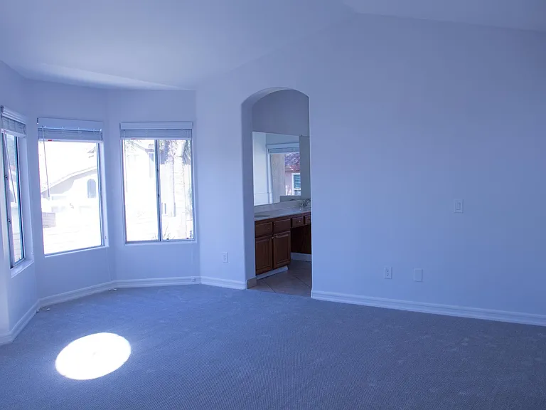 Master bedroom leading into the master bathroom