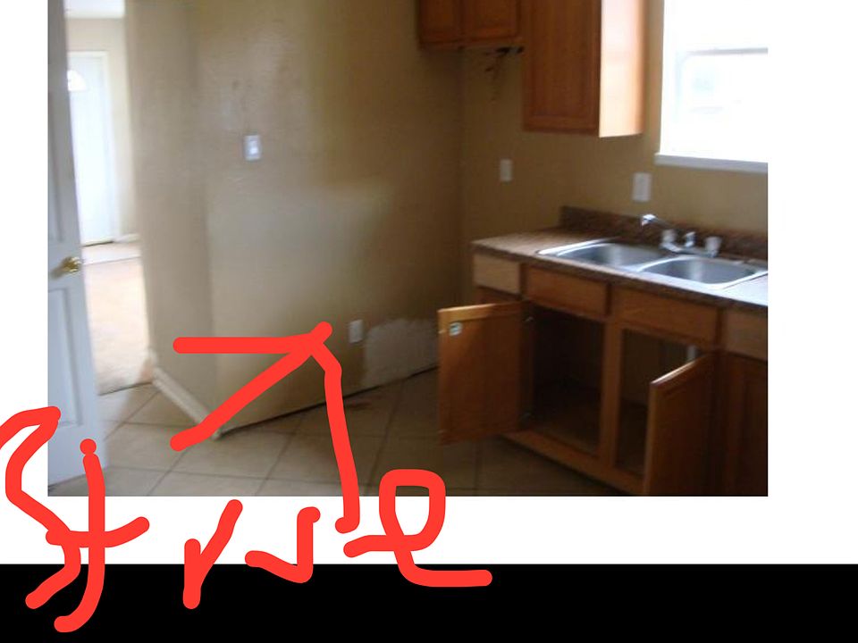 The oven is where the arrow is.