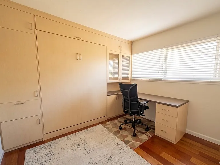 Built-in wall cabinet with murphy bed.