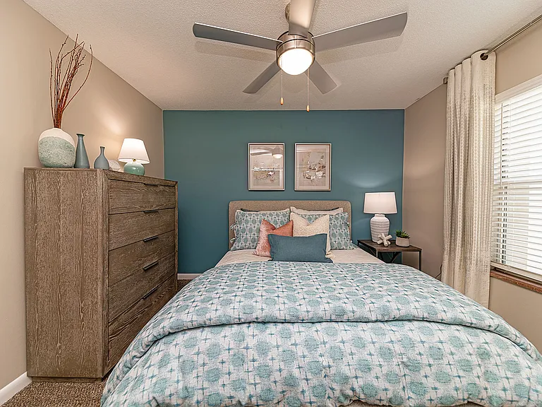 Bedroom with carpet & ceiling fan