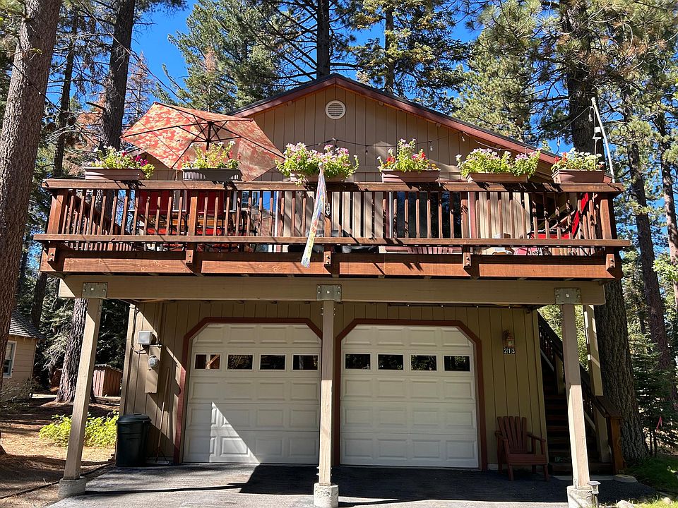 Exterior with sunny deck & easy access driveway