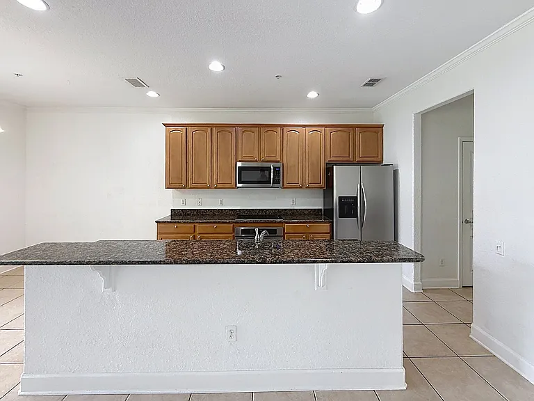 2931 Metro Sevilla Dr #103 — Photo 6