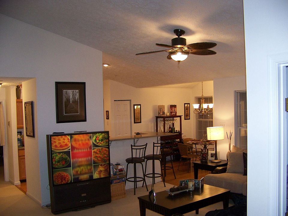 Living room w/ cathedral ceilings