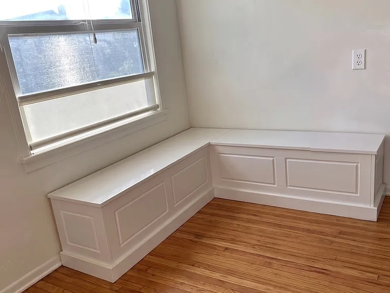 corner banquette with storage underneath for dining are