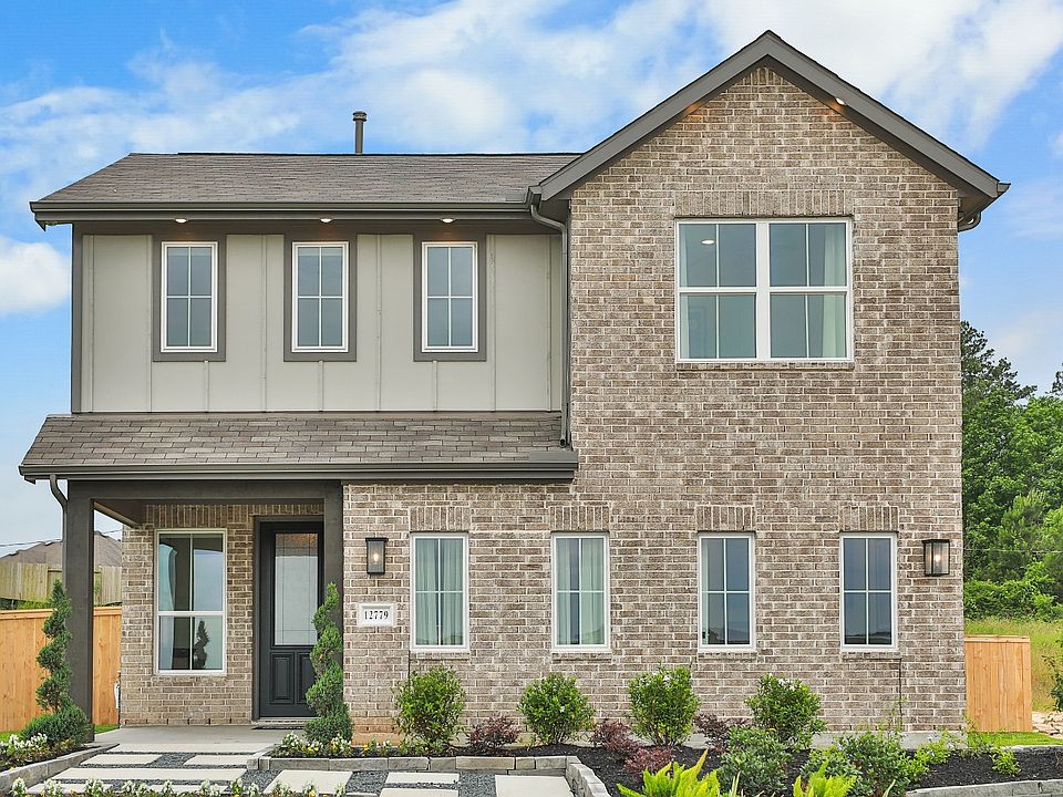 Elegant brick facade with sleek lines and expansive windows. Mostyn Springs offers landscaped sereni