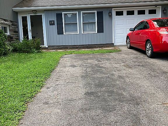 Attached garage and front en