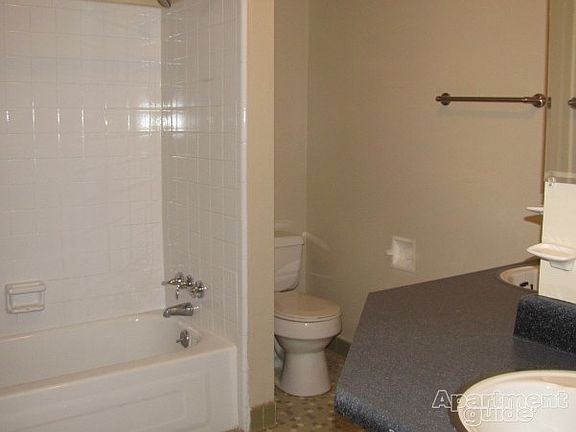 Full bath with his/hers vanity.
