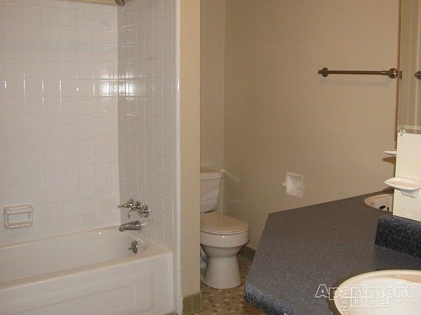 Full bath with his/hers vanity.