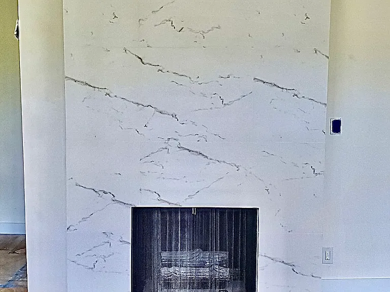 Unit #302 gas FIREPLACE with gorgeous carrara stone surround!