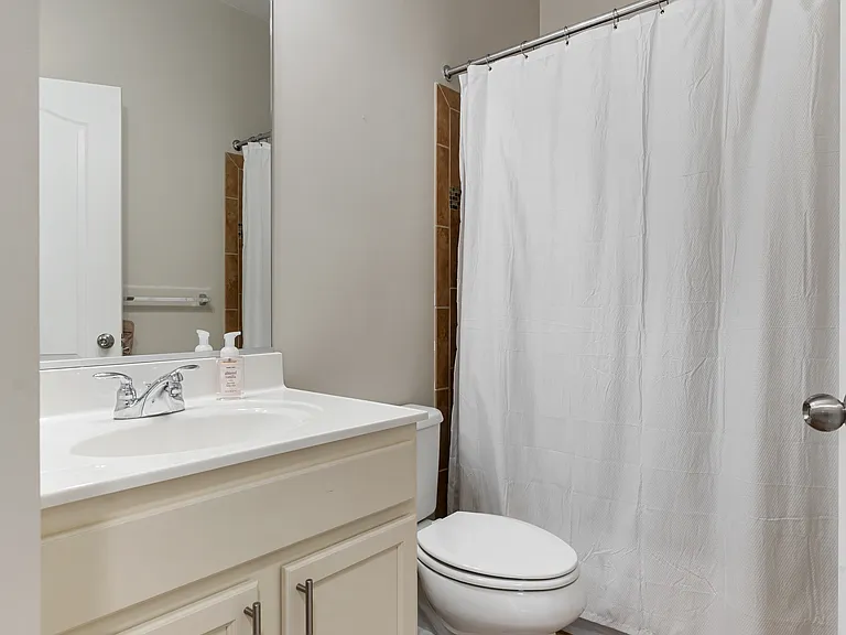 Bedroom #2 full bathroom with bath