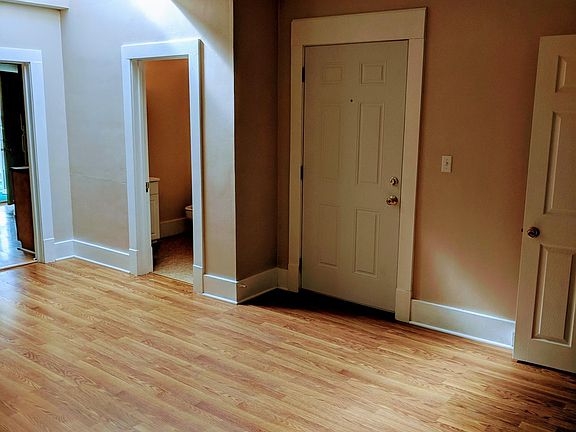 View of the dining room. Far left door enters the kitchen. 