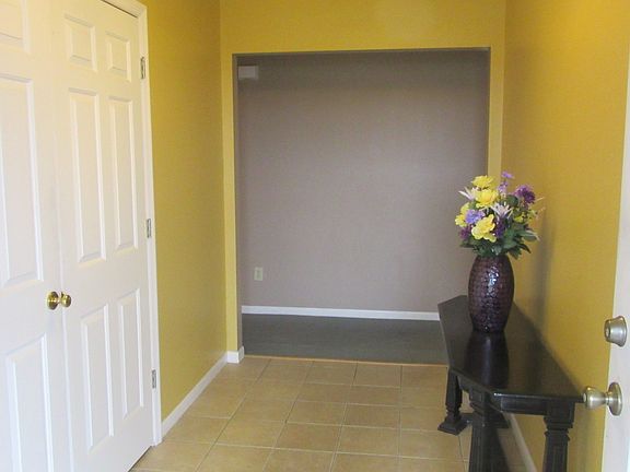 Foyer with closet storage