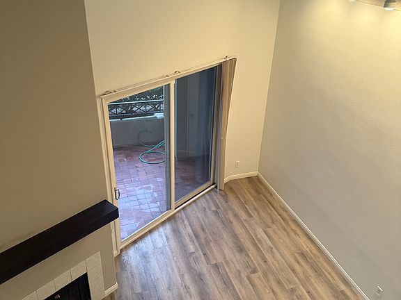 View from loft bedroom into living area