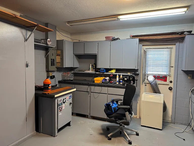 Work space (in garage with AC Unit)