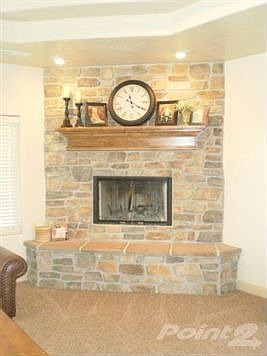 Stone woodburning fireplace