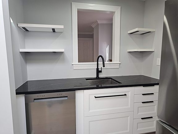 Brand New Cabinets, Appliances, Floors, Paint.