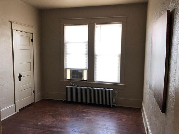 Living/bed room. Carpet being installed