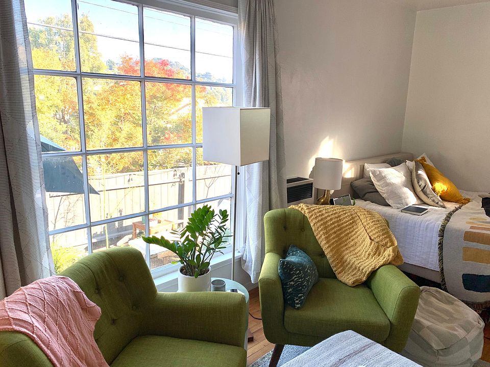 Bring your garden and the sunshine inside as you relax in front of a huge, vintage, paned wood window...