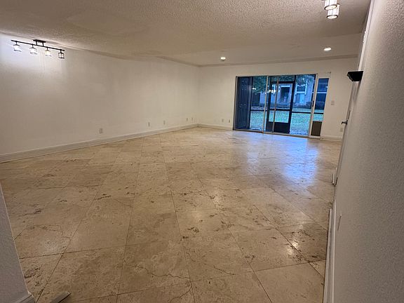 Living room to outside porch , pet door