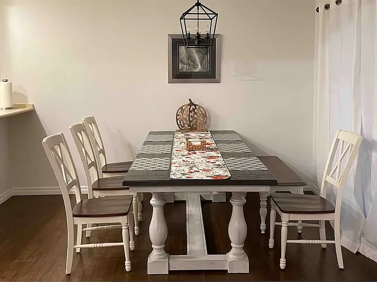 Downstairs common area dinning table for six.