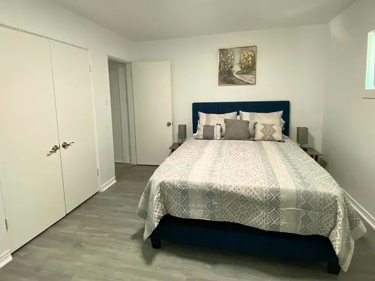 Spacious, cozy studio with a queen bed, full kitchen, living area, dining space & bath.