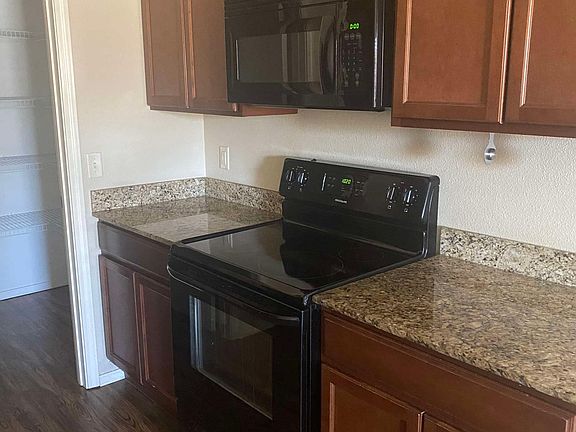 Granite countertops and Frigidaire appliances.
