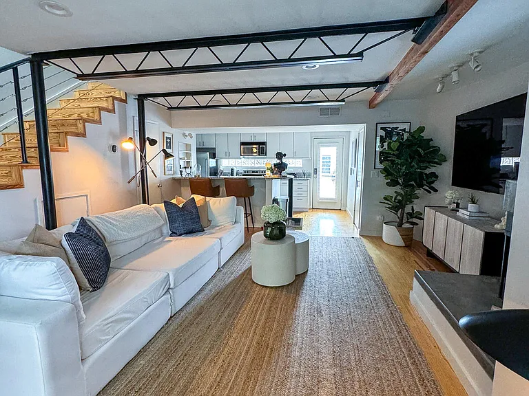 Massive living room that opens to kitchen