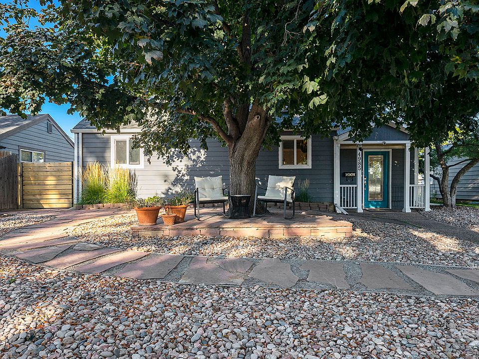 Front entrance with easy-to-manage xeriscaping and front seating area