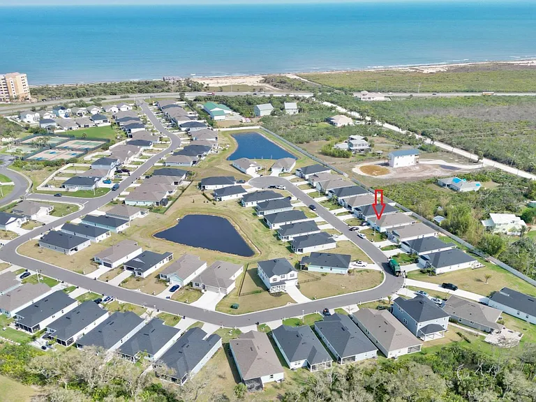 Overhead view of the Las Casitas community and surrounding area. 84 Las Casitas is the one with a red arrow.
