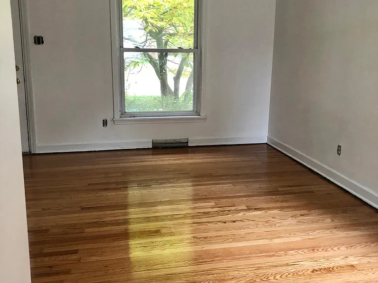 Living Room--Refinished original hardwoods, lots of light.