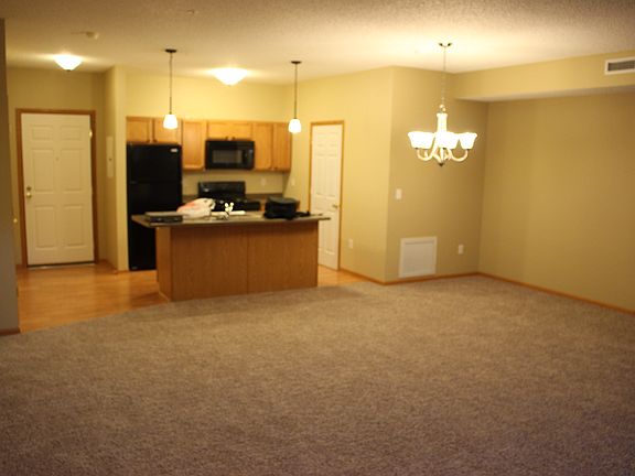 Open floor plan with kitchen and family room