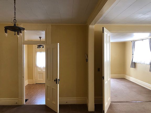 Entry, sitting room, living room, dining room