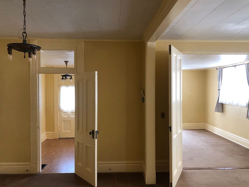 Entry, sitting room, living room, dining room