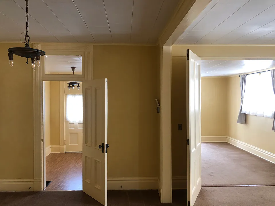 Entry, sitting room, living room, dining room